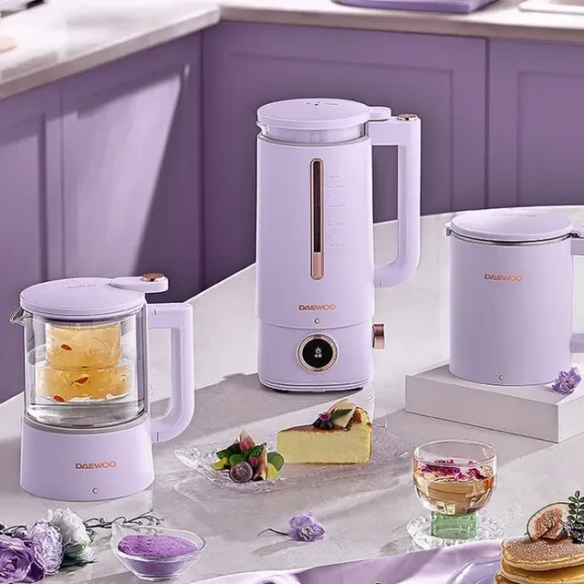 making a milkshake using a hand blender