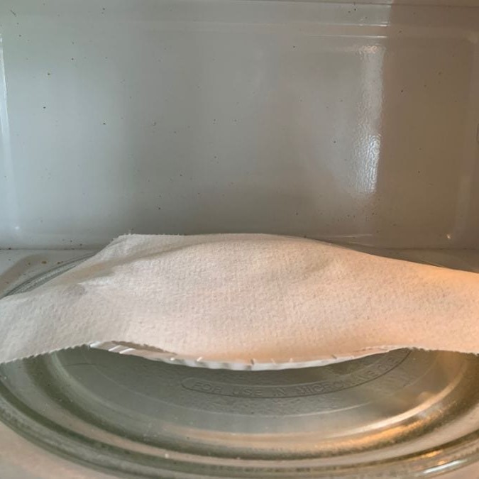 can you put a paper towel in the microwave