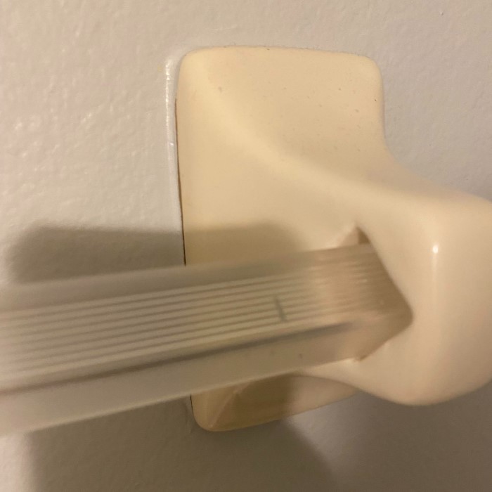 how to remove towel bar